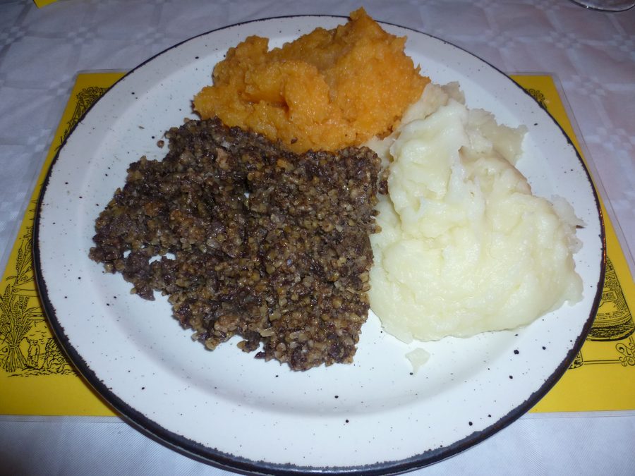 Haggis, neeps and tatties on a plate